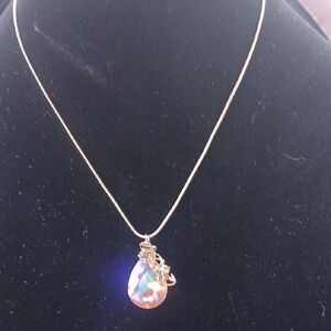 Elegant Gold Necklace with Iridescent Pendant